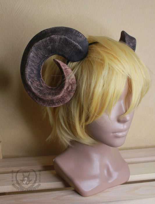 Round realistic succubus demon horns on the headband