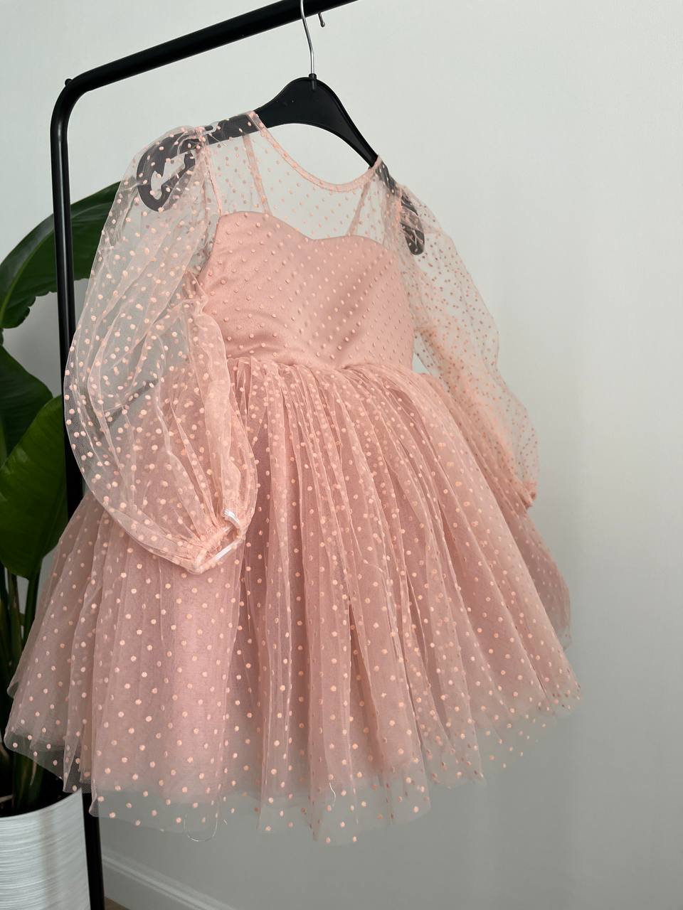 Dress in soft pink with small polka dots