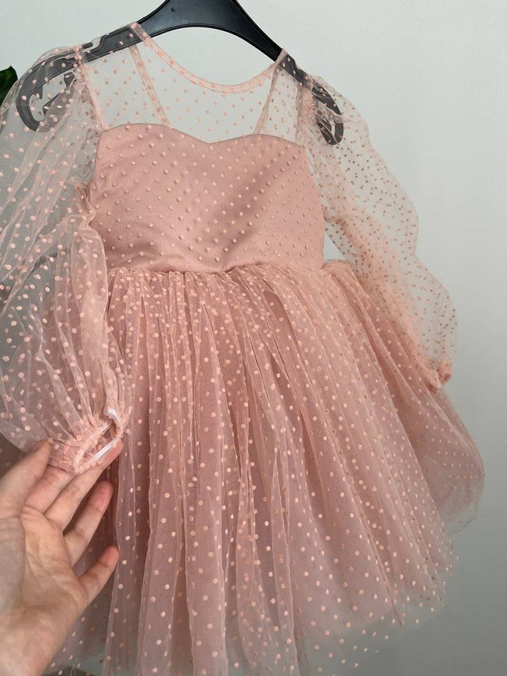 Dress in soft pink with small polka dots