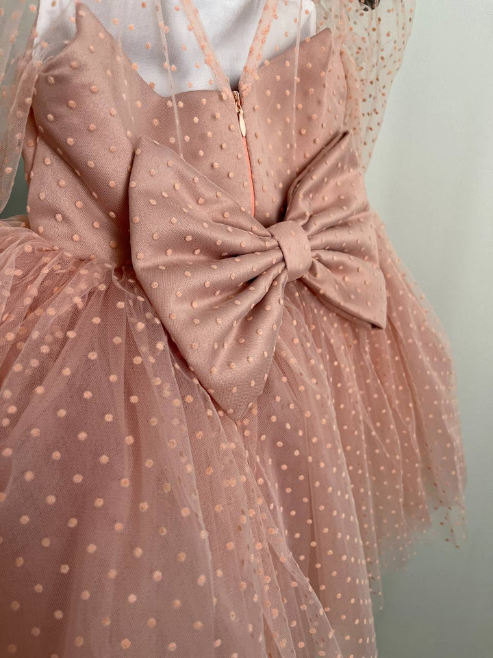 Dress in soft pink with small polka dots