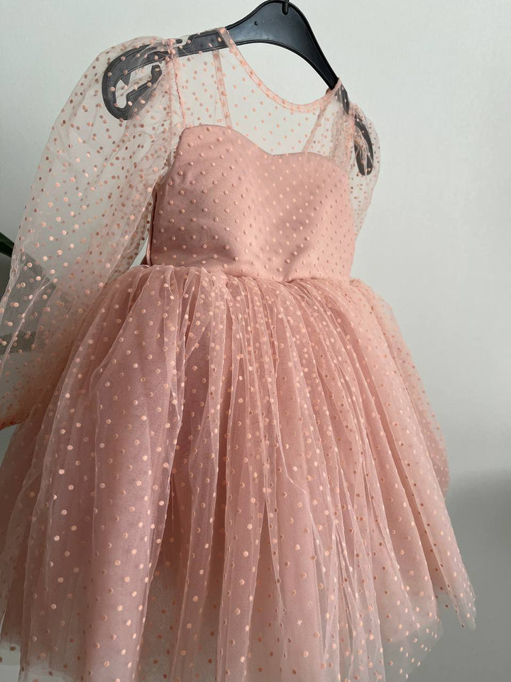 Dress in soft pink with small polka dots