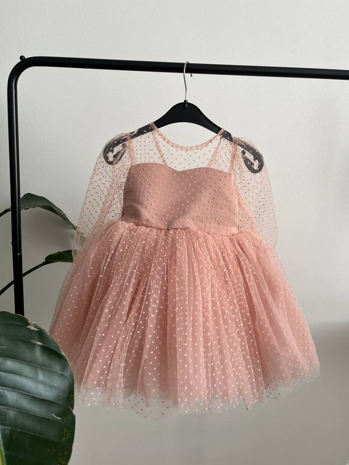 Dress in soft pink with small polka dots