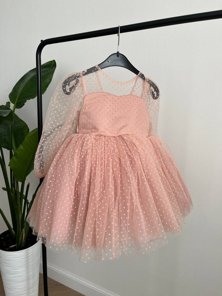 Dress in soft pink with small polka dots