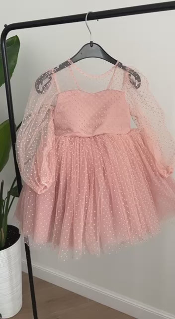 Dress in soft pink with small polka dots