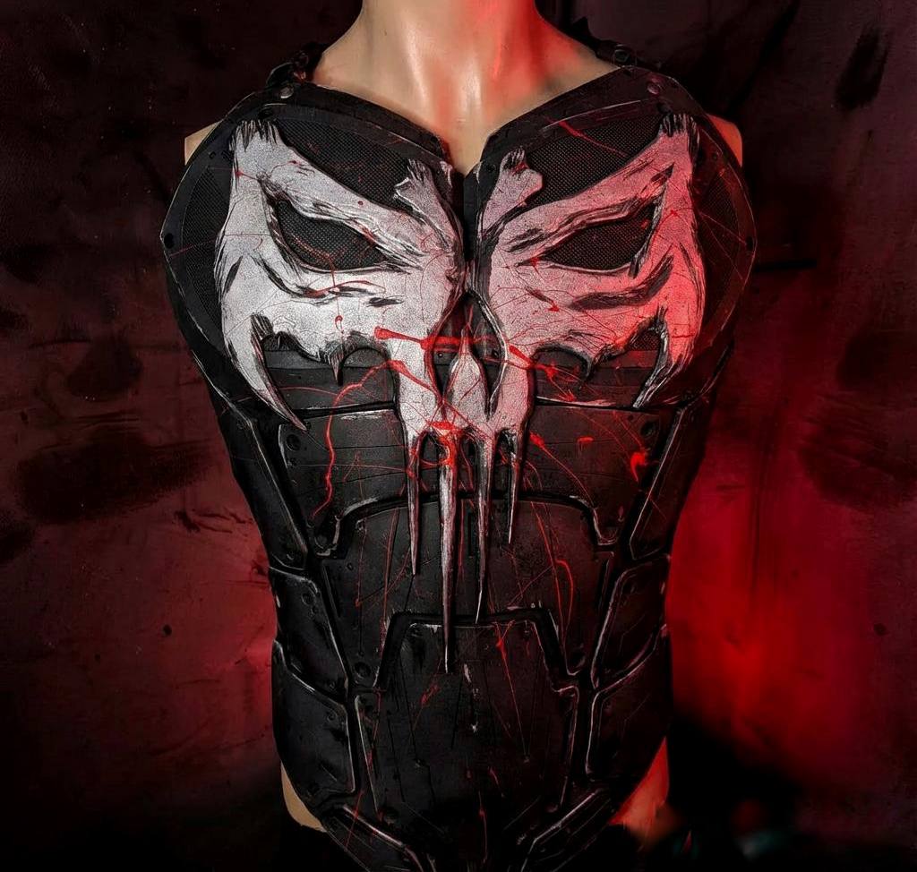 Black tactical chest armor with a white Punisher skull emblem for cosplay and fan films.