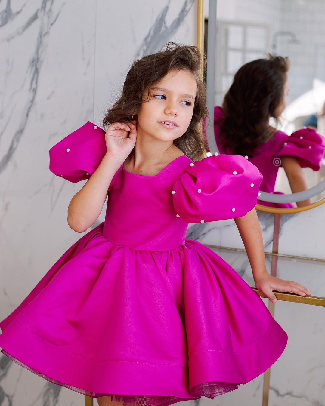 Tulip dress in raspberry color with puffy sleeves embroidered with beads