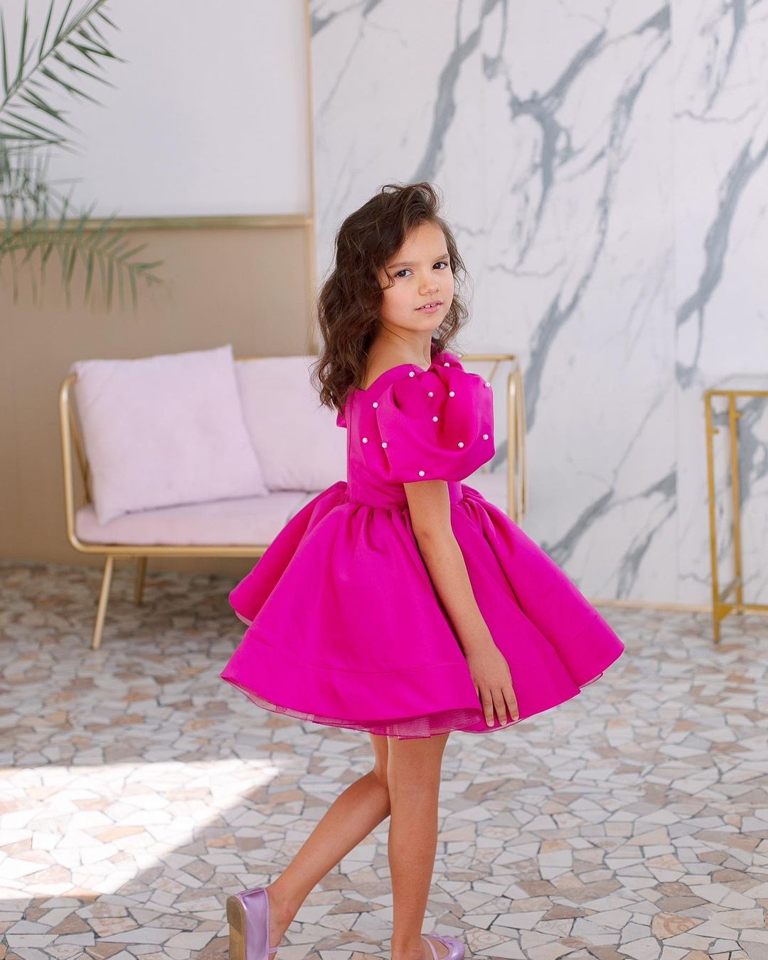 Tulip dress in raspberry color with puffy sleeves embroidered with beads