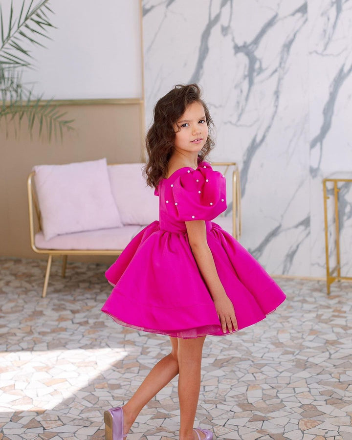 Tulip dress in raspberry color with puffy sleeves embroidered with beads