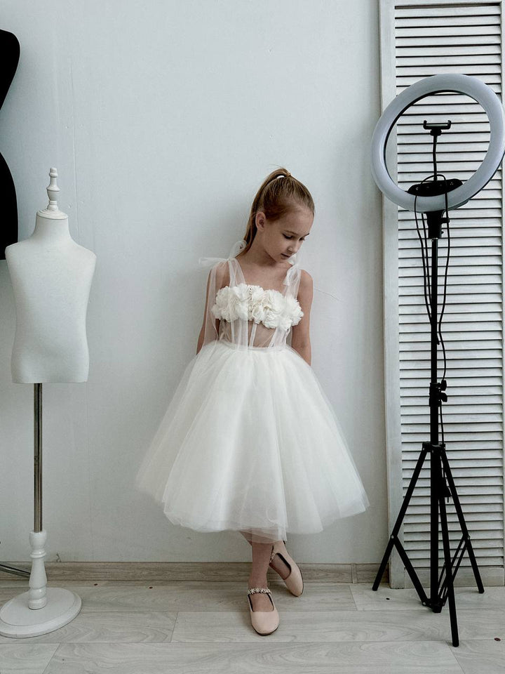 Ivory romantic dress with imitation corset line, floral bodice and delicate delicate tulle ties